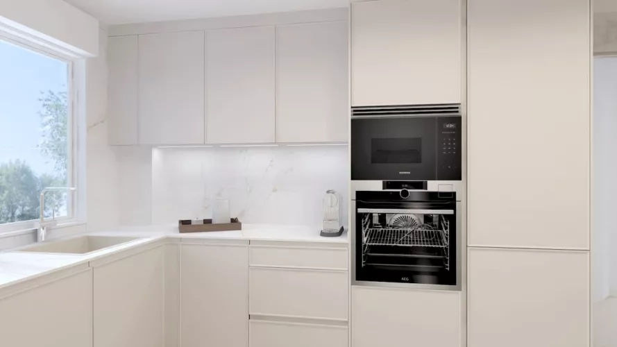 Cocina clara con mesado auxiliar