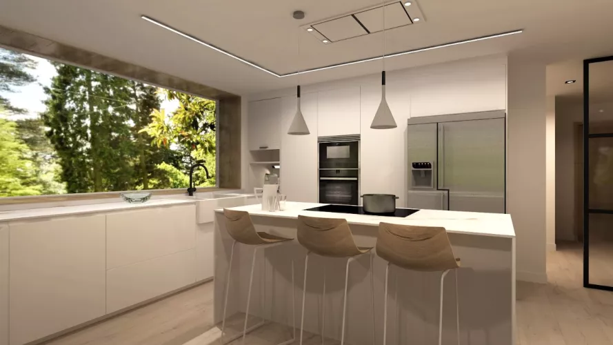 Cocina Santos blanca abierta al salón con encimera de Neolith